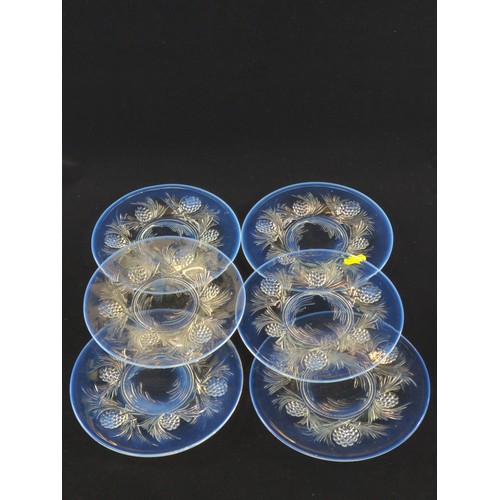 631 - Six c.1930's Jobling style opalescent pressed glass plates in fir cone design, dia. 17.5cm