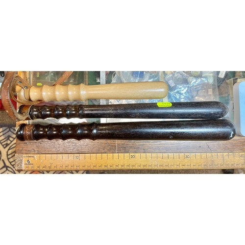 1147 - Four truncheons inc. WPC handbag truncheon and three Victorian truncheons (one with strap, two witho... 