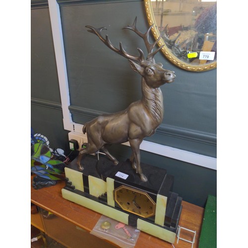 452 - Art Deco mantle clock featuring a bronze stag on slate and onyx base L43cm H65cm