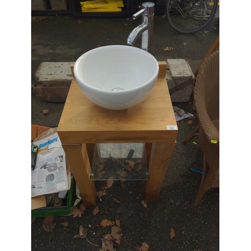 325 - Small round ceramic basin on wooden stand with tap and plumbing