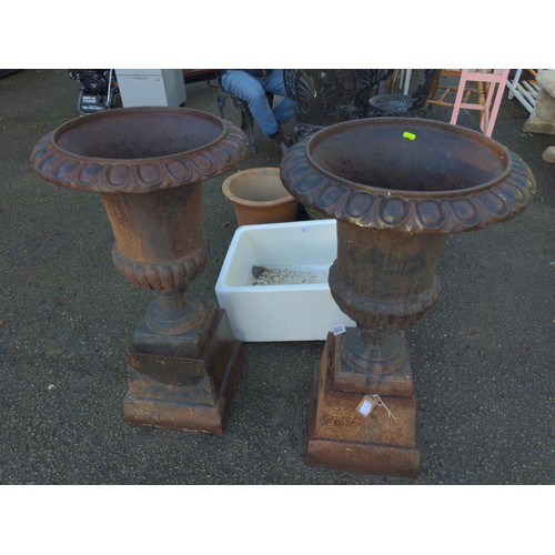 330 - Pair of large classical cast iron fluted urns with cast base.  Height 90 cm Dia 49 cm to top