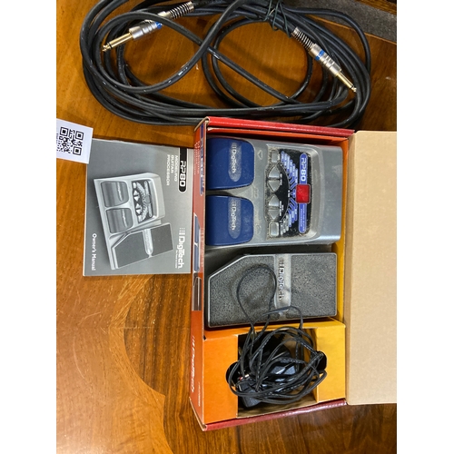 604 - Digitech AP80 modeling guitar processor and guitar lead. 