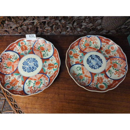 836 - Two Imari pattern plates with marks to base.