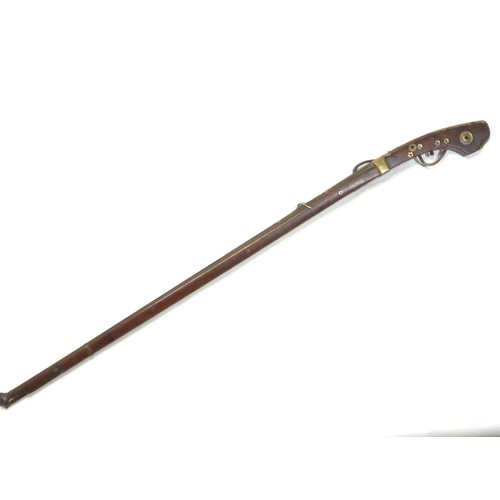 775 - Japanese matchlock rifle circa 1820 with inland brass scenes on barrel L. 135cm