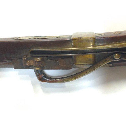 775 - Japanese matchlock rifle circa 1820 with inland brass scenes on barrel L. 135cm