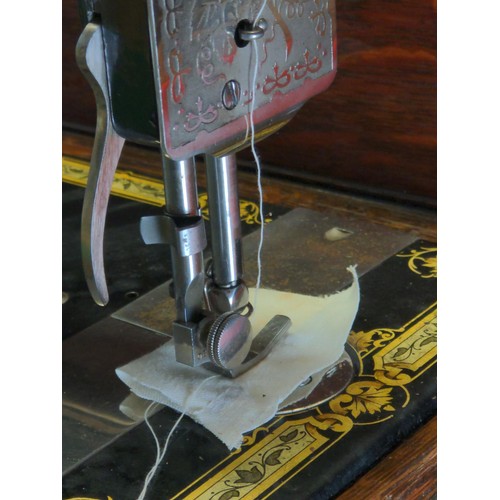 138 - Vintage Singer sewing machine in case