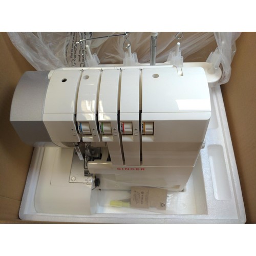 140 - Singer thread overlocker 14SH754 with box of threads etc