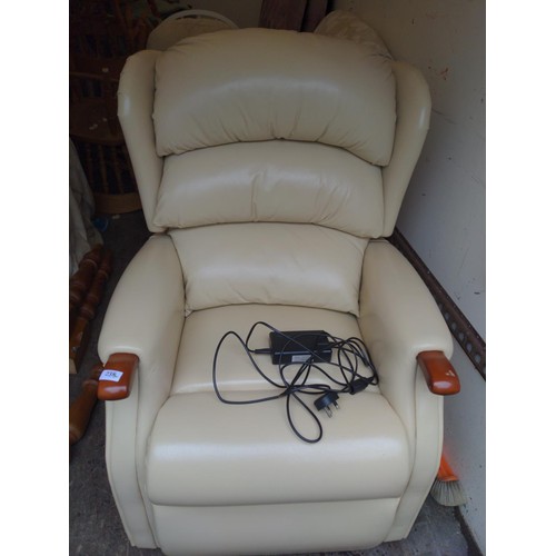 238 - T-Motion leather electric riser recliner. Very clean condition.