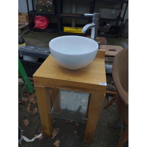 325 - Small round ceramic basin on wooden stand with tap and plumbing