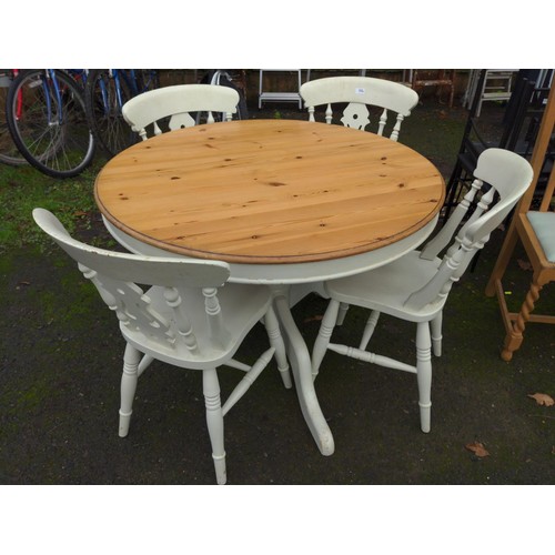 356 - Round pine pedestal table with painted base together with 4 chairs