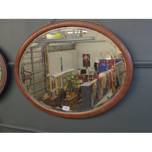 437 - Oval bevelled vintage mirror. W73 H54 cm