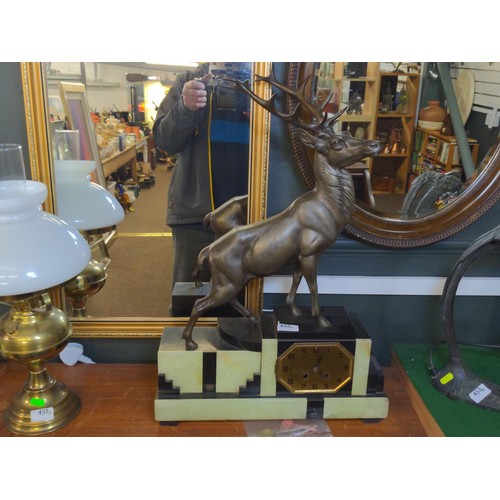 452 - Art Deco mantle clock featuring a bronze stag on slate and onyx base L43cm H65cm