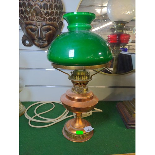 460 - Converted copper based oil lamp with green glass globe. H43cm