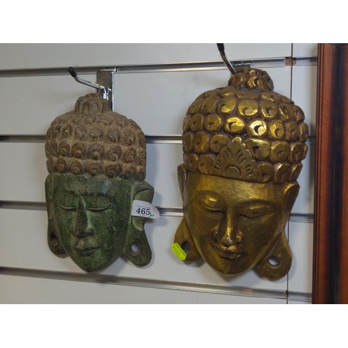 465 - Two Thai style wall hanging face masks, one gilded and one painted. 