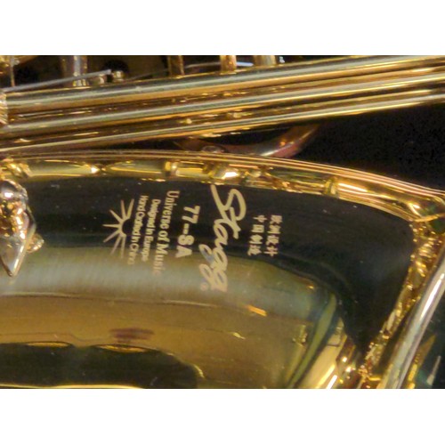 603 - Stagg 77-SA hand crafted in China Alto Saxophone with original hard case.