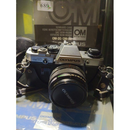 689 - Olympus OM 10 manual SLR film camera with Zuiko 50 mm standard lens and Soligor multi dedicated flas... 