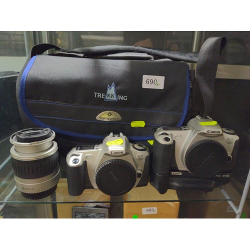 690 - Two Canon EOS 300 camera bodies one with motor battery pack, Canon 28-90mm zoom lens and large padde... 