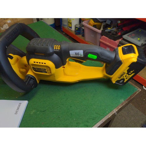 86 - DeWalt DCM563 battery hedge trimmer with 18v 5Ah battery, does not include charger. Appears in very ... 