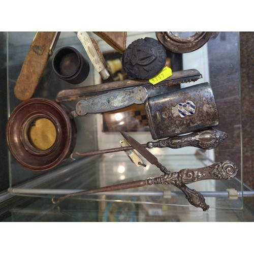 667 - Shelf of mixed metal and treen items inc, vestas, frames, button hooks, fish slice etc..,