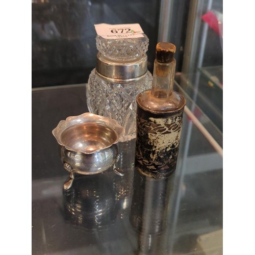 672 - HM silver items to include collared crystal jar, salt and a small glass bottle with silver sleeve