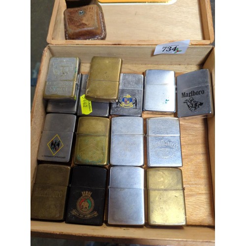 734 - Box full of Zippo lighters approx 15 plus one leather holder.