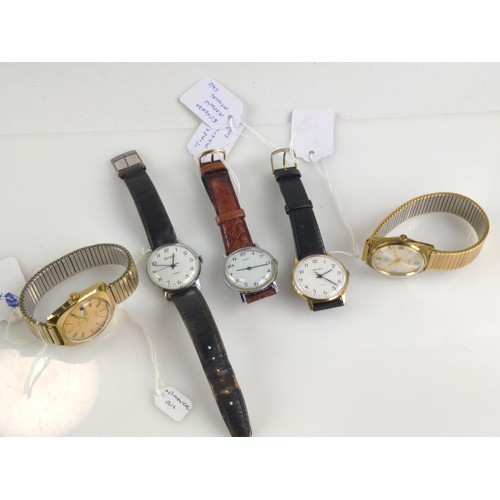 621 - Four mechanical watches, including Accurist 21 jewels day/date, Amida 21 jewels, Timex and two Sekon... 