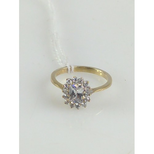 627 - 9ct gold clear stone cluster dress ring. Size Q. Gross weight 2.90g