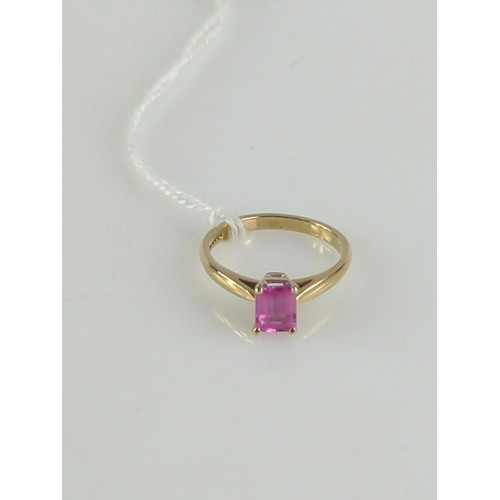 628 - Baguette cut synthetic pink spinel, 9ct gold ring. Size O. Gross weight 2.4g