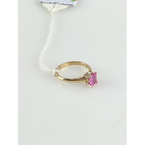 628 - Baguette cut synthetic pink spinel, 9ct gold ring. Size O. Gross weight 2.4g