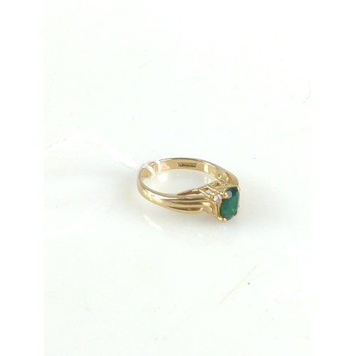 629 - 9ct gold ring set with synthetic emerald and CZ. Size P. Gross weight 3.90g