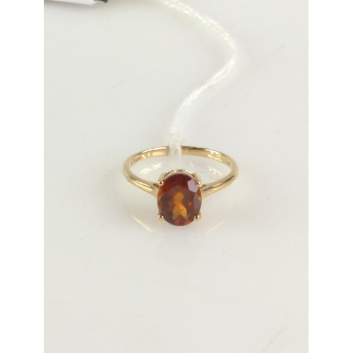 633 - Hessonite garnet single stone ring on 9ct gold. The garnet being an oval mixed cut. Approx 9.3mm x 7... 