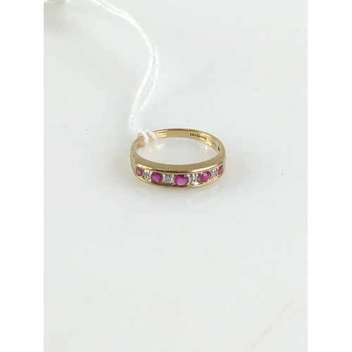 634 - 9ct gold, ruby and diamond half eternity ring. Size N1/2 to O. Gross weight 2.08g