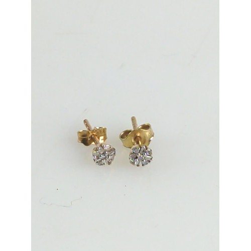 643 - 9ct and diamond stud earrings. Gross weight 0.61g