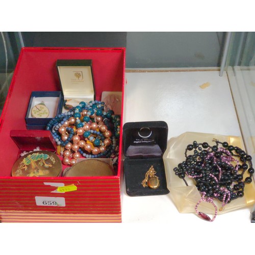 659 - Red box with costume jewellery, inc 2 compacts, necklaces, brooch, etc..