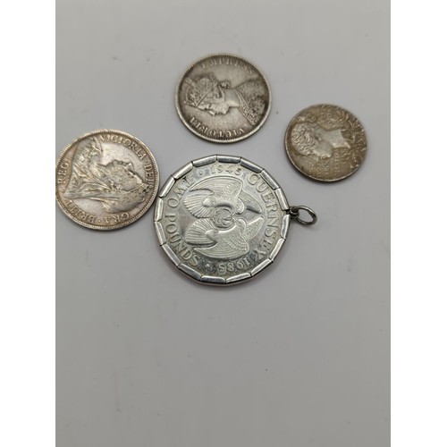 746 - Mounted Guernsey 1985 silver £2 coin together with three Victorian silver coins, gross weight ... 