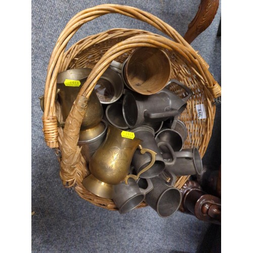 846 - Basket of pewter tankards.