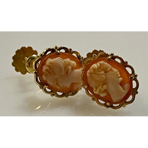 645 - Pair of 9ct gold cameo earrings with screw-back fitting,  length 18mm, gross weight 2.3 grams