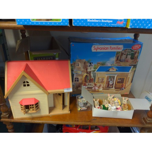 102 - Shelf of Sylvanian families items