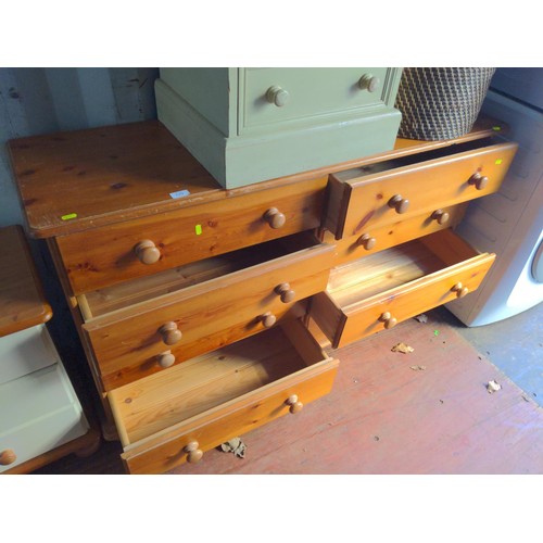 229 - Pine 8 drawer double chest of drawers. W136cm D42cm H80cm