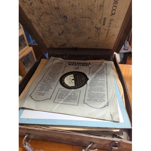 636 - Golden Melody portable gramophone with a box of vinyl and some singles. 