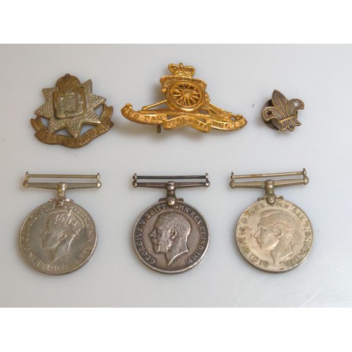 424 - Medals and badges inc. WWII Defence Medal and War Medal together with WWI war medal awarded to 14770... 