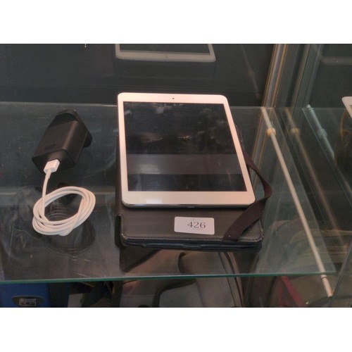 426 - Mini ipad 2nd gen, with cable and folding case.