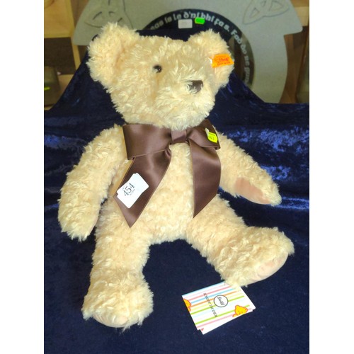 454 - Steiff Bear with brown bow, 2024 (teddybears 34 beige) with all original labels attached.