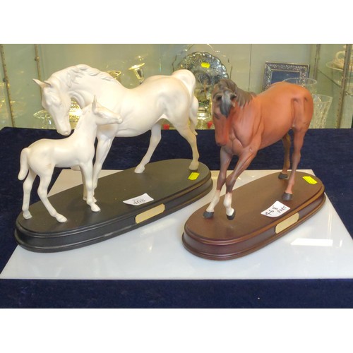 468 - Two Royal Doulton horse figures on plinths. Spirit of Affection and Spirit of Youth. Plinth 26cm x 2... 