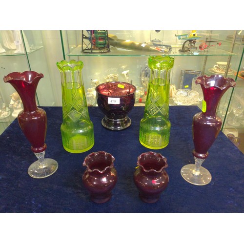 479 - Shelf of assorted coloured glass including green Bohemian style vases.