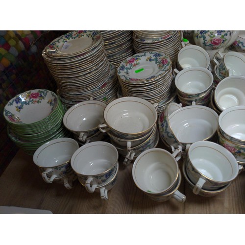 488 - Large Booths Floradera pattern tea and dinner service inc, soup bowls, plates, saucers, cups, tea po... 