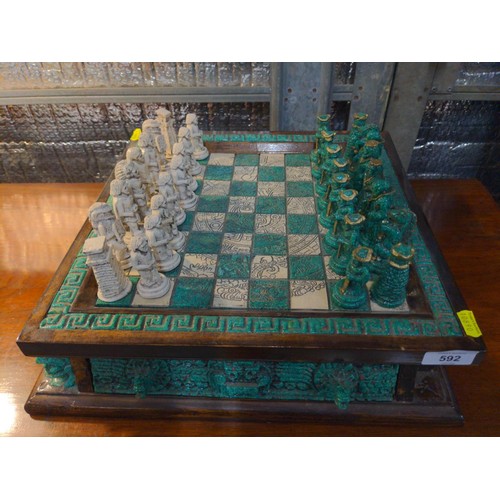 592 - Mexican chess set- Conquistadors Vs Incas. 39cm x 39 cm x H11cm.