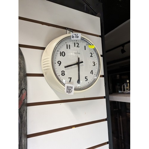 676 - Acctin wall clock, 21cm dia.