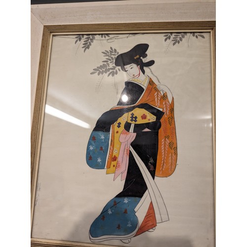 265 - Pair of framed oriental artworks on silk 42 x 50cm