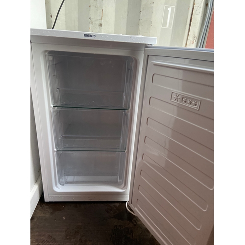 334 - Beko under-counter freezer with three drawers. W48 D48 H82cm